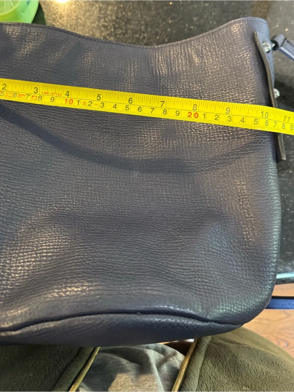 Marc Jacobs Pebbled Leather and suede bucket crossbody bag.